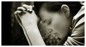 Photo Credit: "Young Woman Praying" from blogs.voices.com